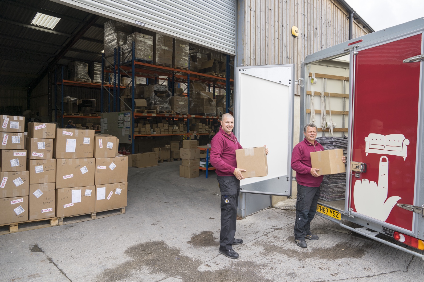 Johnson's team handling packed and inventoried belongings